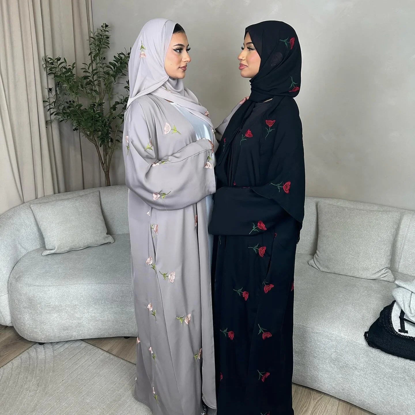 The Maison Brodee in gray and black worn together with matching hijabs