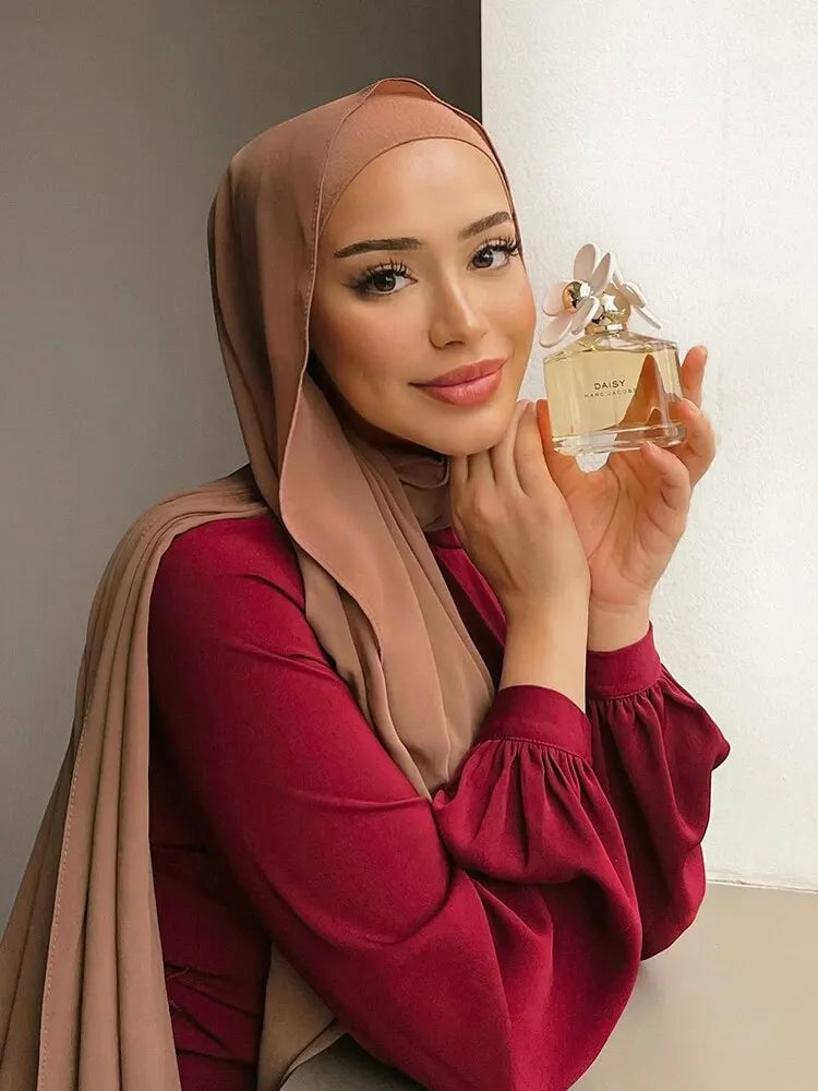 Model wearing a blush chiffon hijab