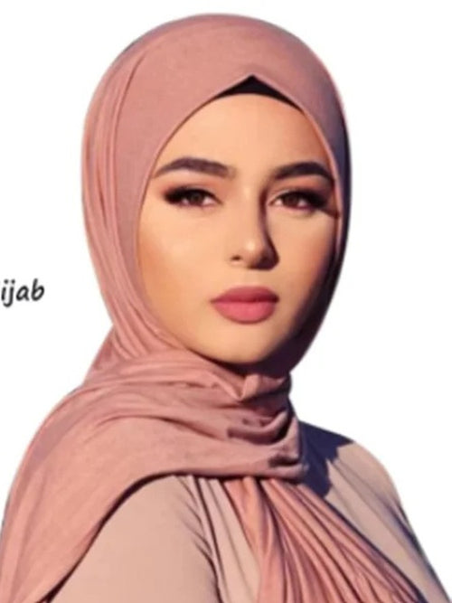 Model wearing a dusty rose modal jersey hijab