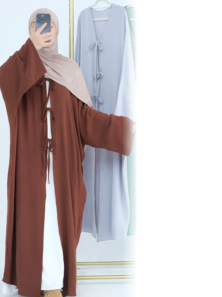 Model wearing The Maison Quietude kimono in dark coffee, full length